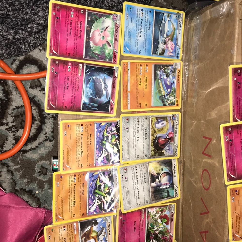 Lot of 48 rare & reverse holographic Pokémon cards